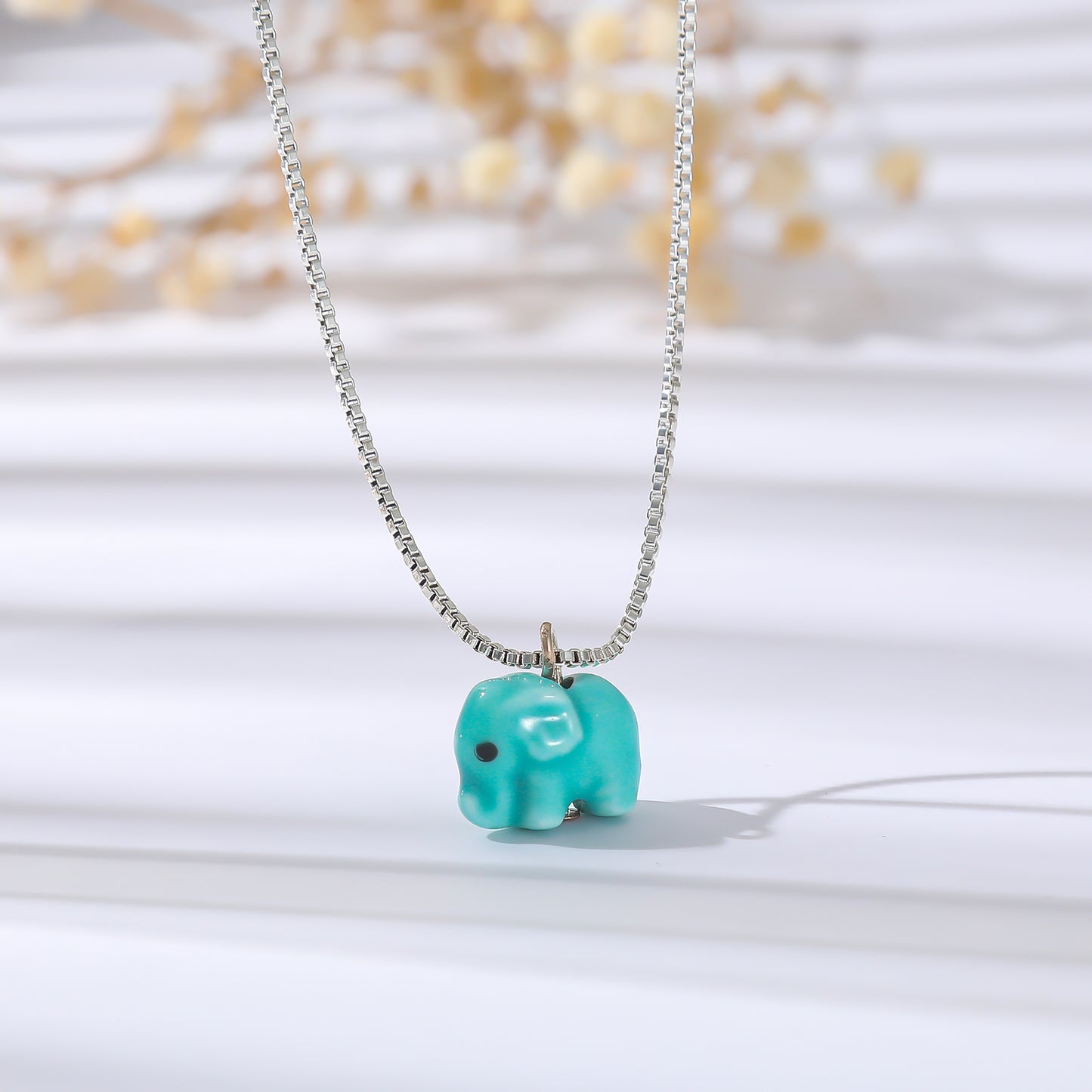 Assorted Elephant Bead Necklace on Silver Chain - Cute and Playful Pendant