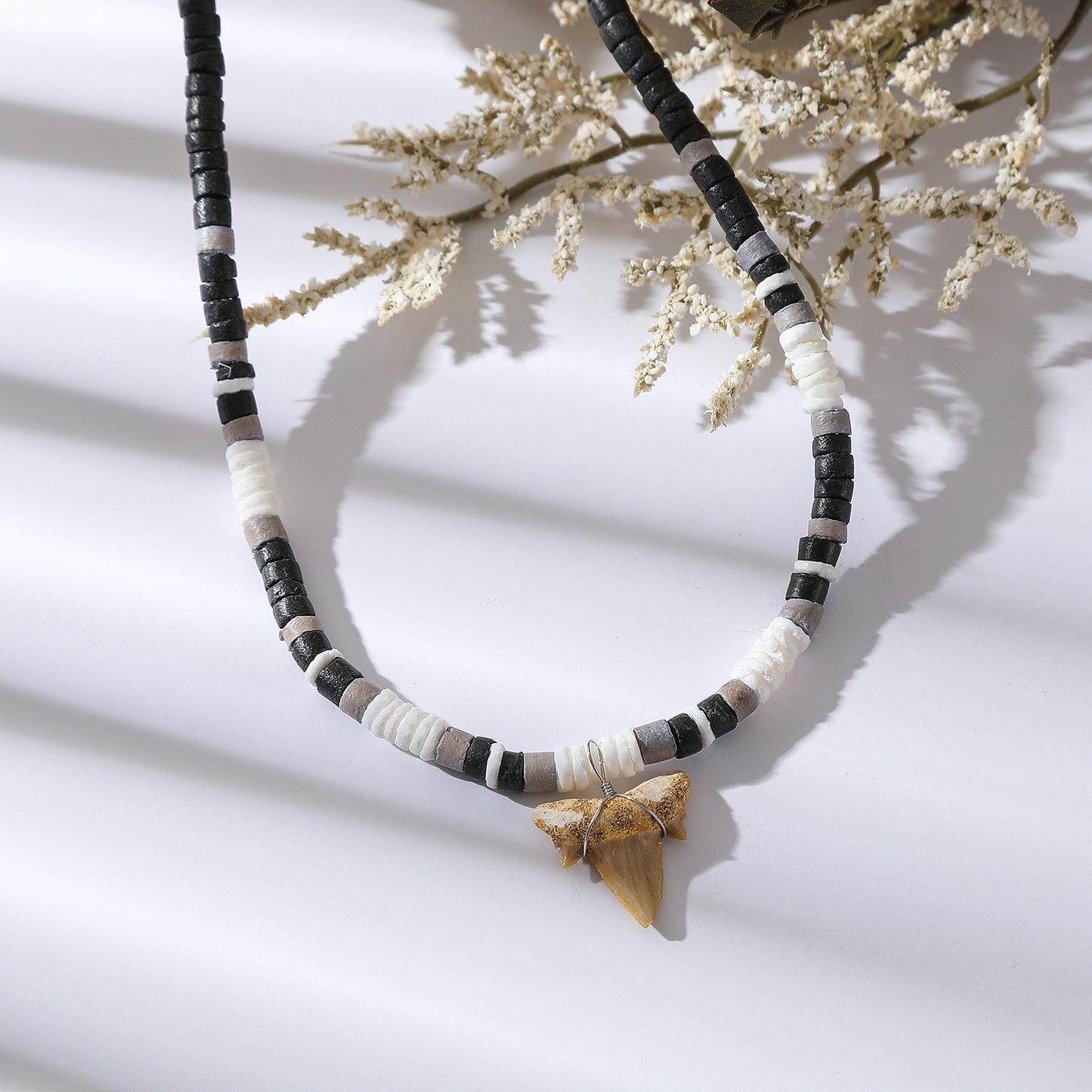 Black, White, and Grey Beaded Necklace with Natural Shark Tooth Pendant