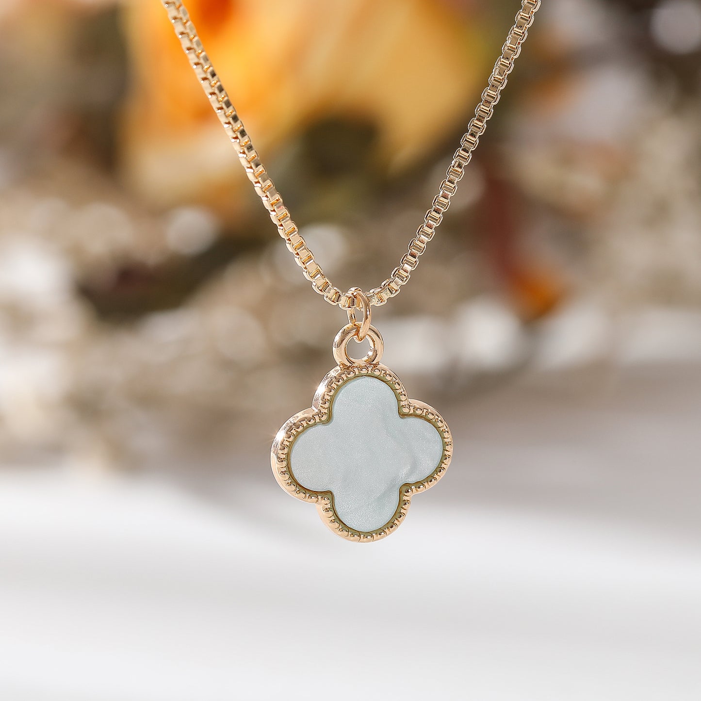 Luxe Quatrefoil Clover Pendant Necklace – Gold Chain with Iridescent Charm in Pastel Colors