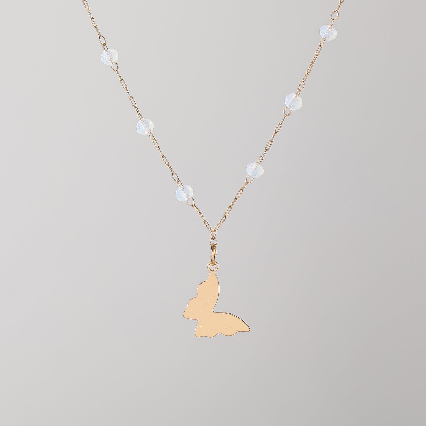 Delicate Gold Chain Necklace with Assorted Faceted Beads & Gold Butterfly Charm - Elegant & Versatile Jewelry for Women, Perfect for Everyday Wear or Special Occasions